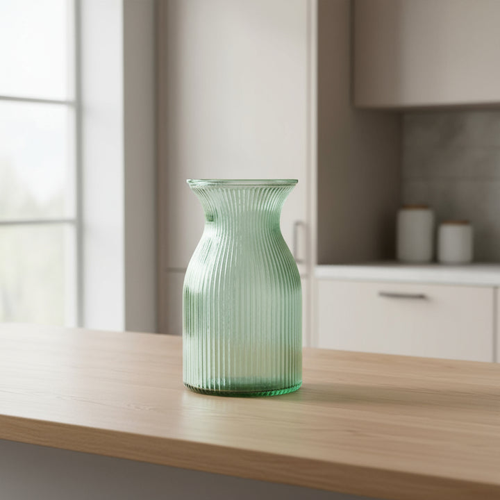 a 20cm tall green glass vase