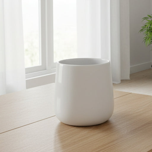 White ceramic cup on a white background