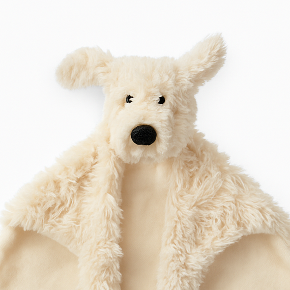 small plush toy comforter laying flat on a plain white background