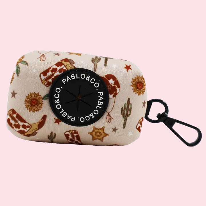 Small pouch with desert-themed design and 'Pablo & Co.' branding on a white background